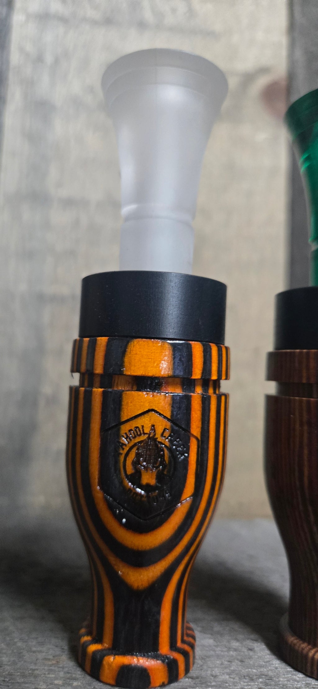 Orange and black duck call