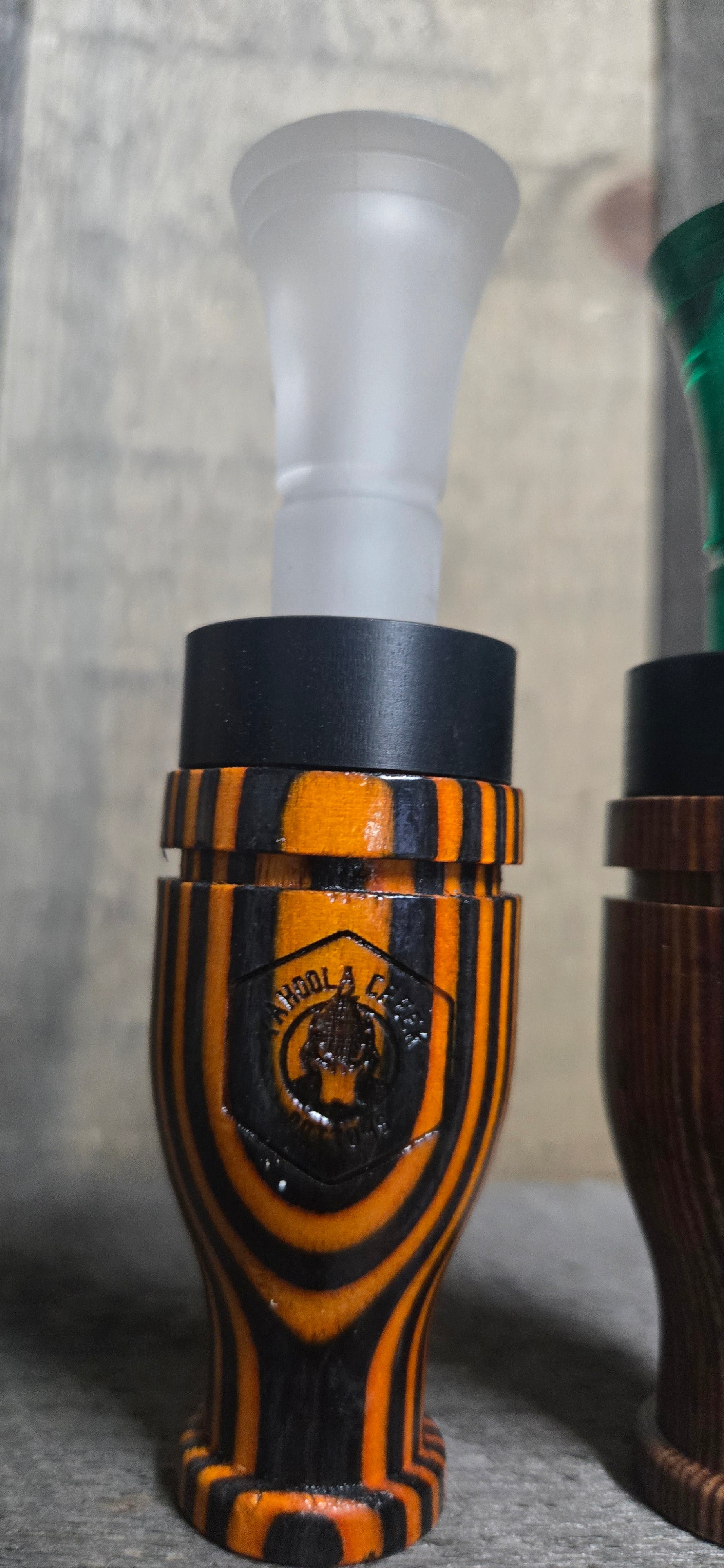 Orange and black duck call